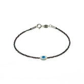 Espinélios 2mm + olho grego